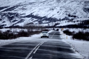 Road with car and snow.